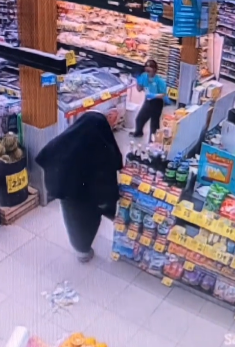 Employee shocked to see a man dressing as Valak.