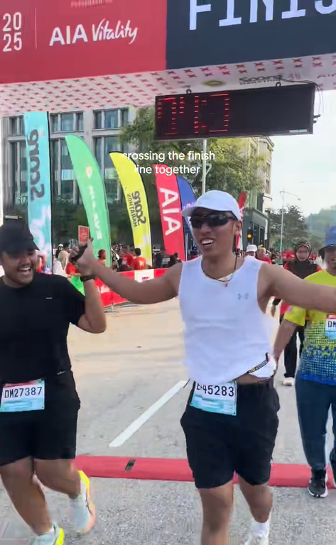 M'sian man & blind friend completes 21KM marathon together