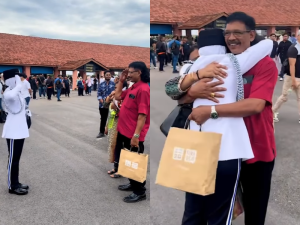 A daughter salutes to her parents after completing inspector training