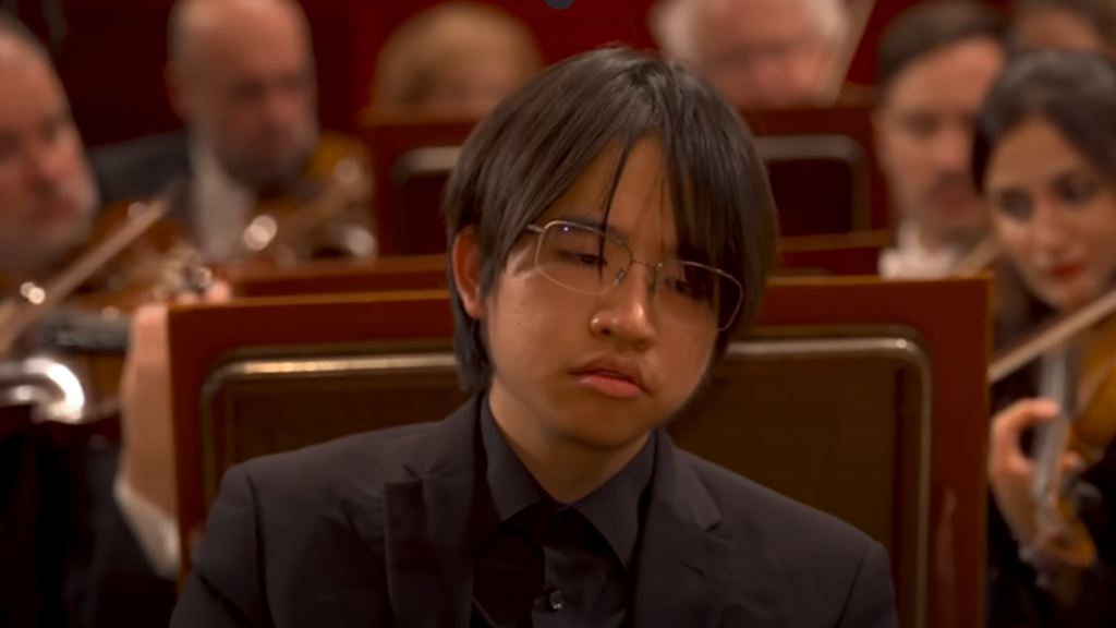 Screenshot from the video shows Vincent Ong was playing the piano