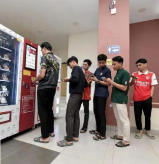 The students were queuing up to buy food in front of the vending machine
