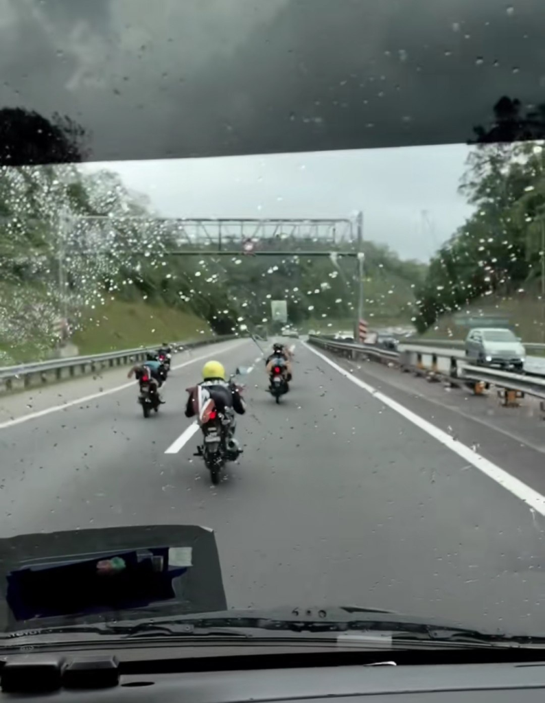 Screenshot from the video shows that five teenage students were blocking an ambulance