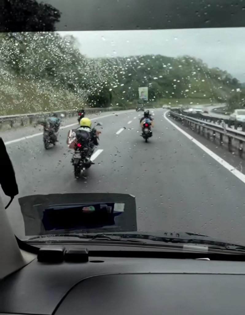 Screenshot from the video shows that a group of Mat Rempit were spreading across multiple lanes