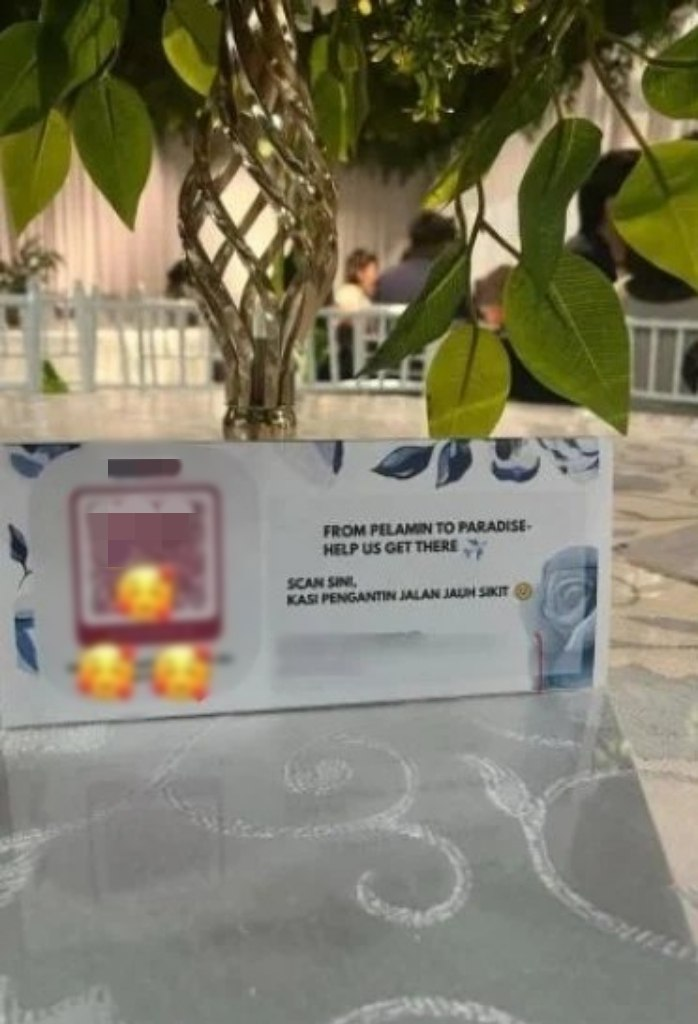 A M’sian couple placed QR codes at their wedding to collect honeymoon funds instead of red packets