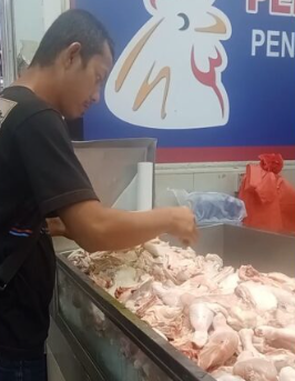 The father was seen buying food at the market