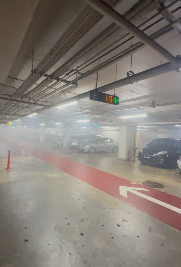 Thick smoke reported in the mall's carpark area. 