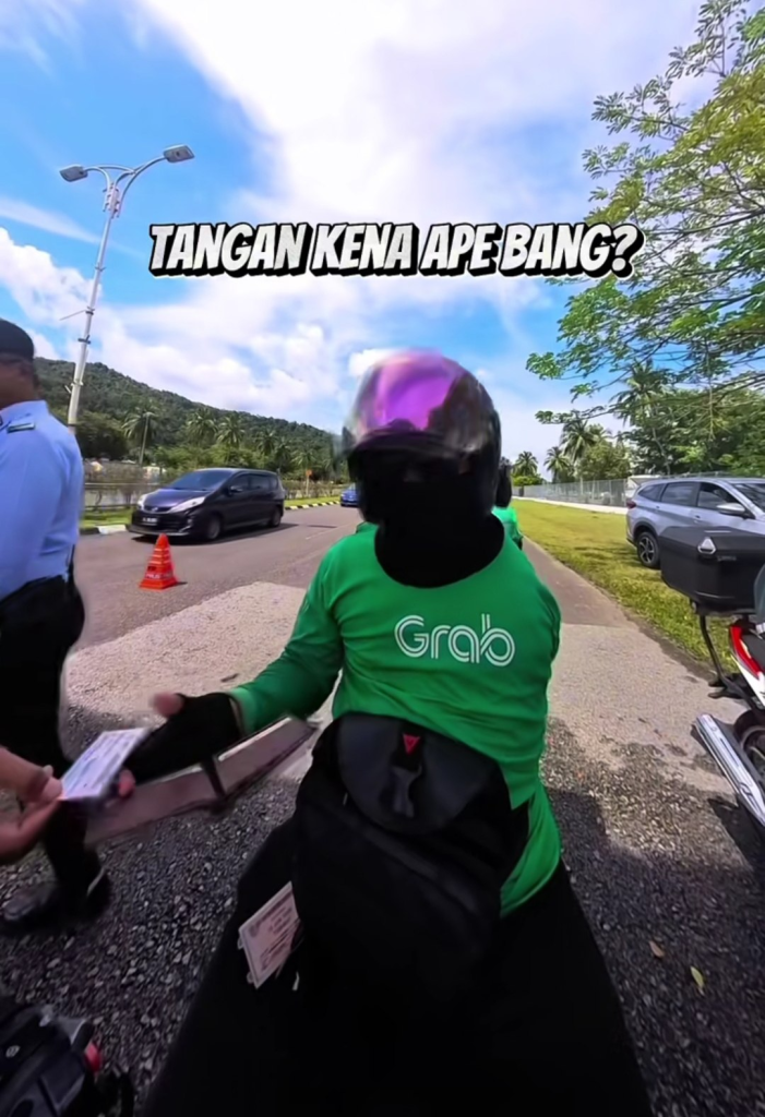 The traffic police asked the rider about his hand